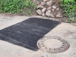Neuer Asphalt am Traveberg